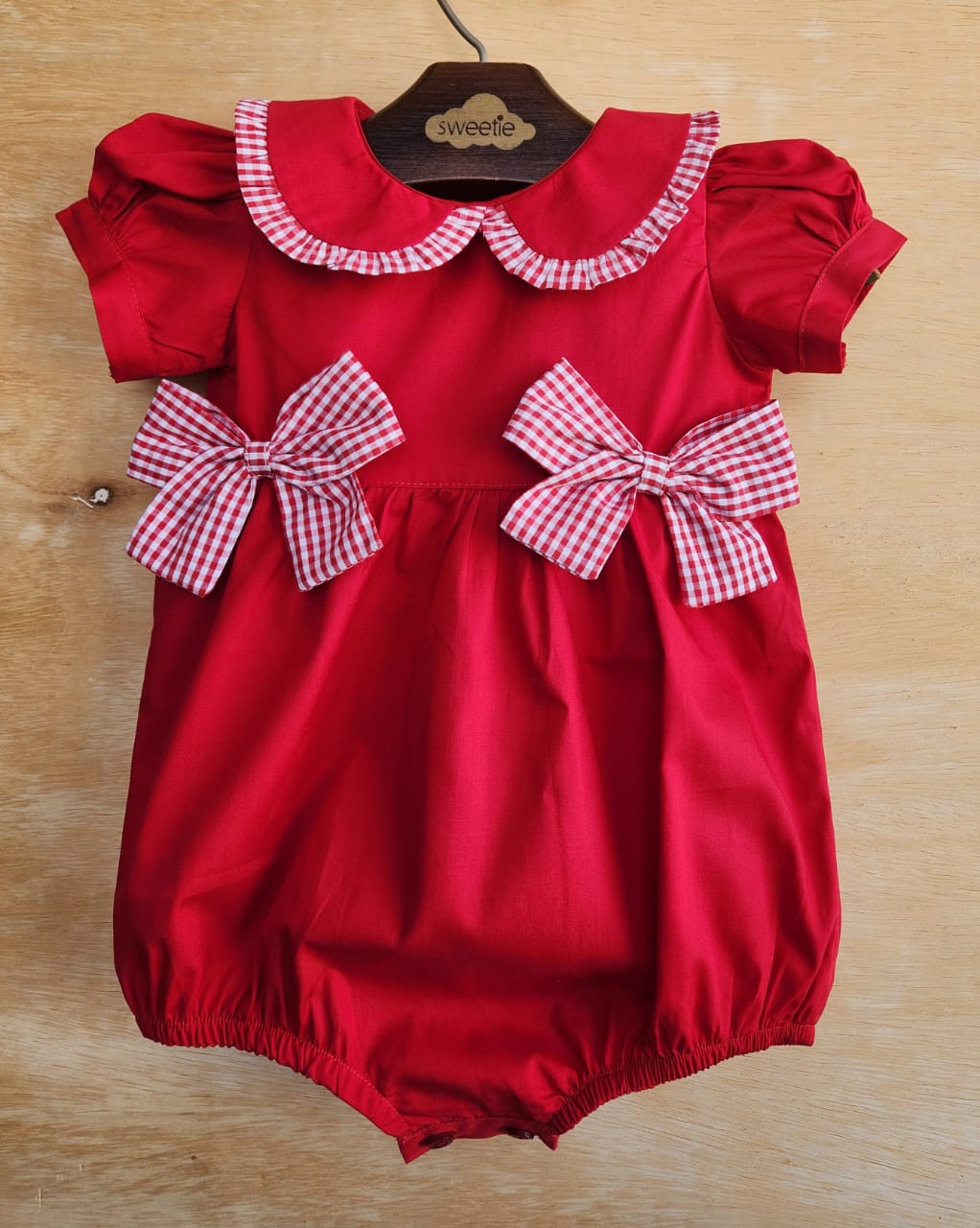 Pimpão Bebê Menina Lacinho Vermelho